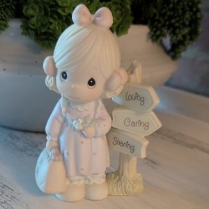 Precious Moments Pastel Pink and Cream Girl Figurine with Signpost